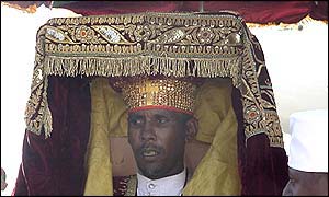 A priest carrying an Orthodox relic, returned from Britain in 2002